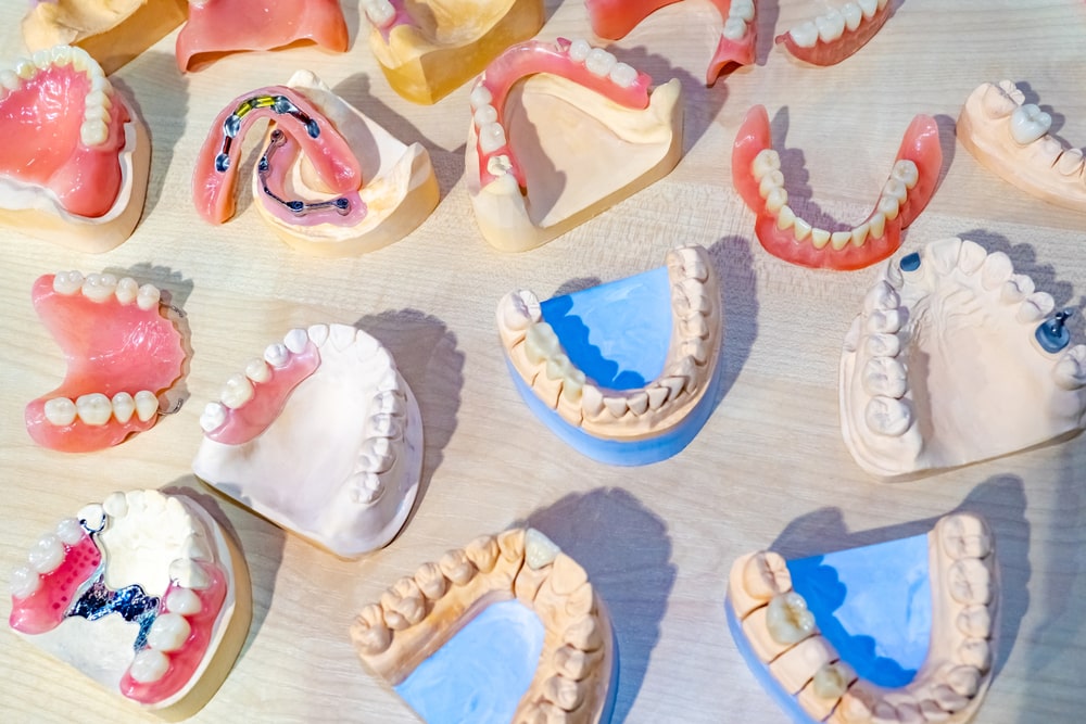 False teeth. Dentistry. Prosthetic dentistry. Dental plates. Artificial tooth. Dental treatment. Dental material.